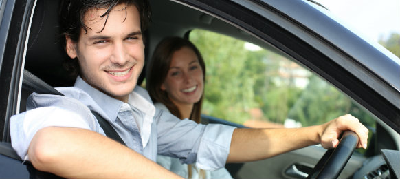 happy couple in a car hire