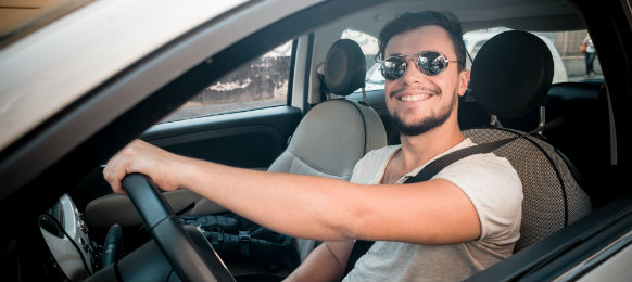 man driving a car hire in alba